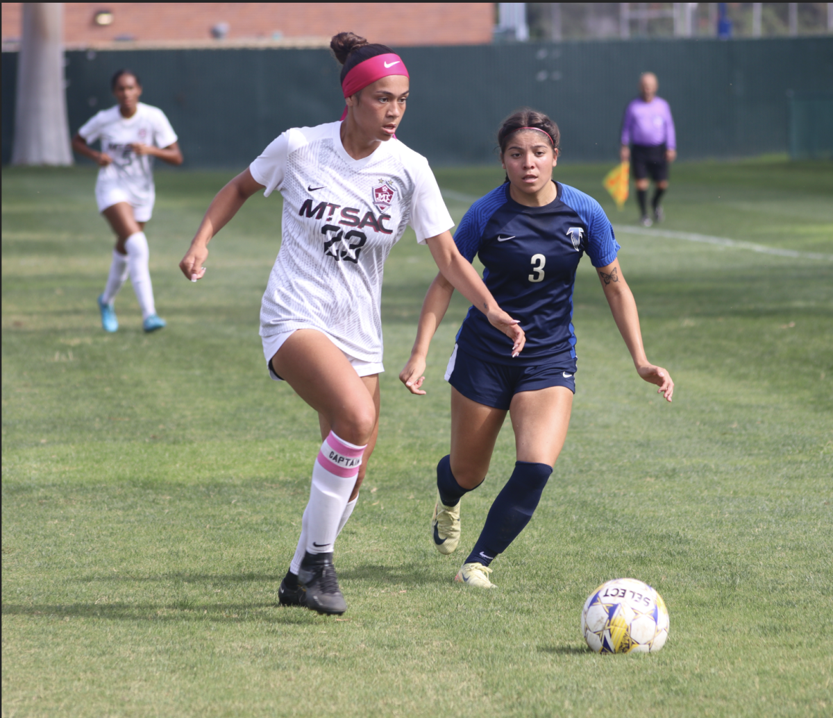 #3, Ariana Rivera, trying to get the ball back from Mt. Sac, #23,Tiana Egland. 